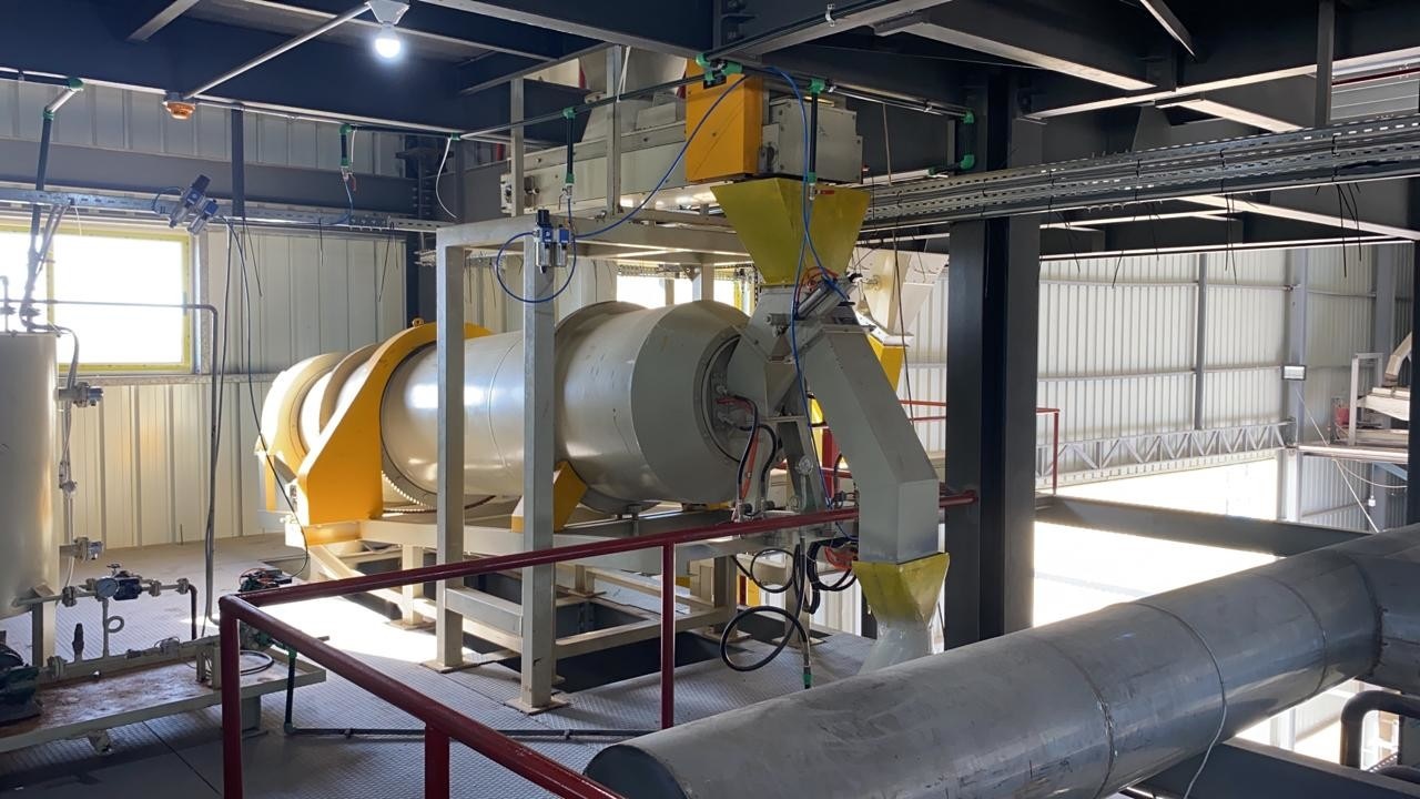 Drum coater for fish feed coating process